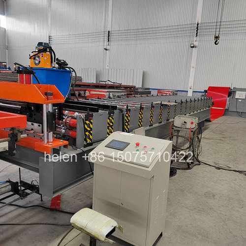 Heavy duty fully automatic hydraulic decoiler supplying steel coils to 925 IBR roofing line
